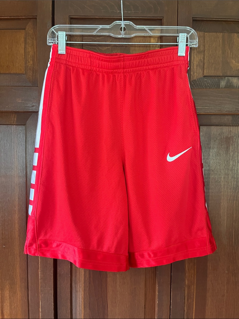 Nike Red Mesh Athletic Shorts with White Swoosh